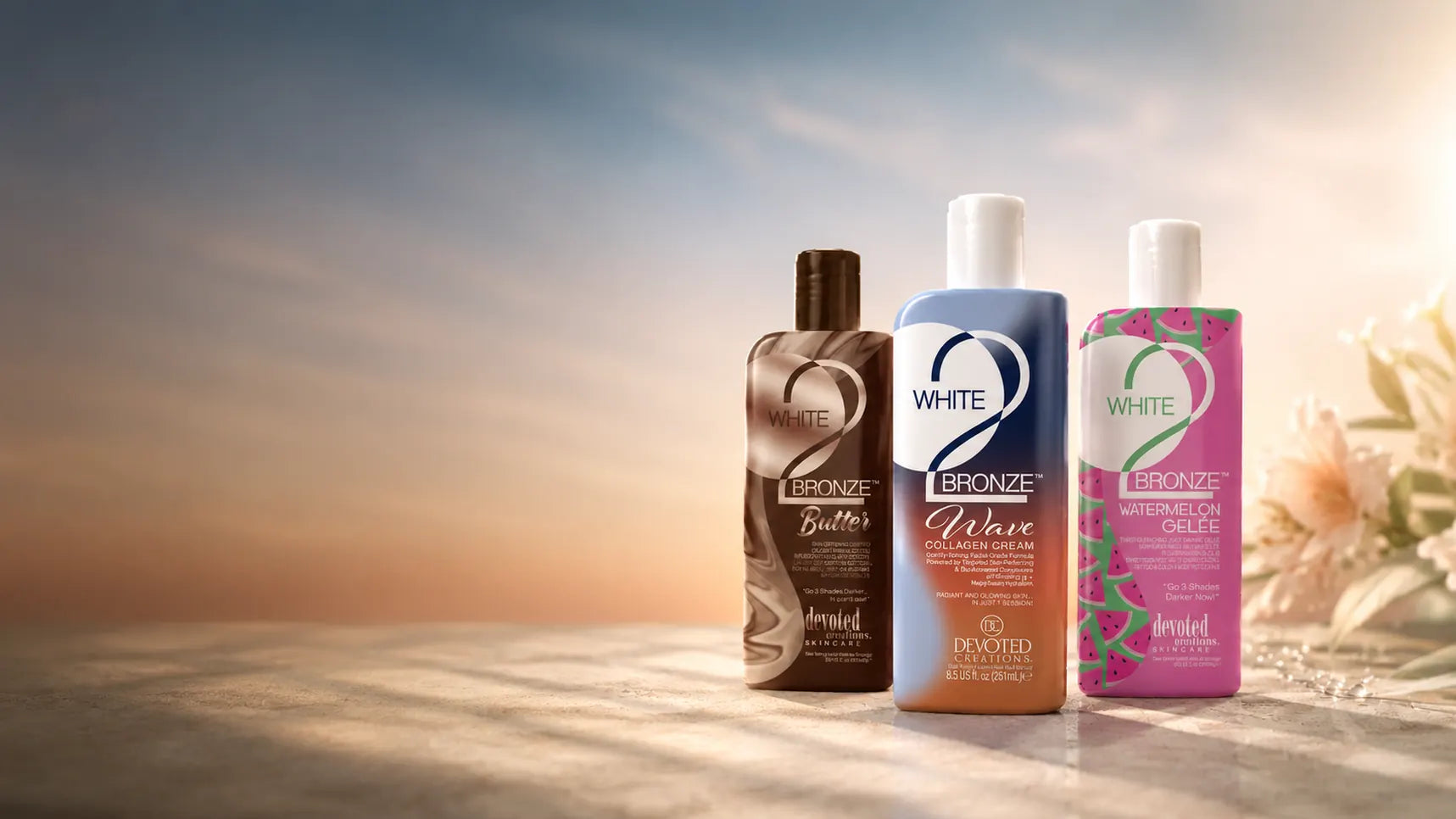 White 2 Bronze — Butter, Wave, and Watermelon Gelée bottles on a bright sunlit beach.