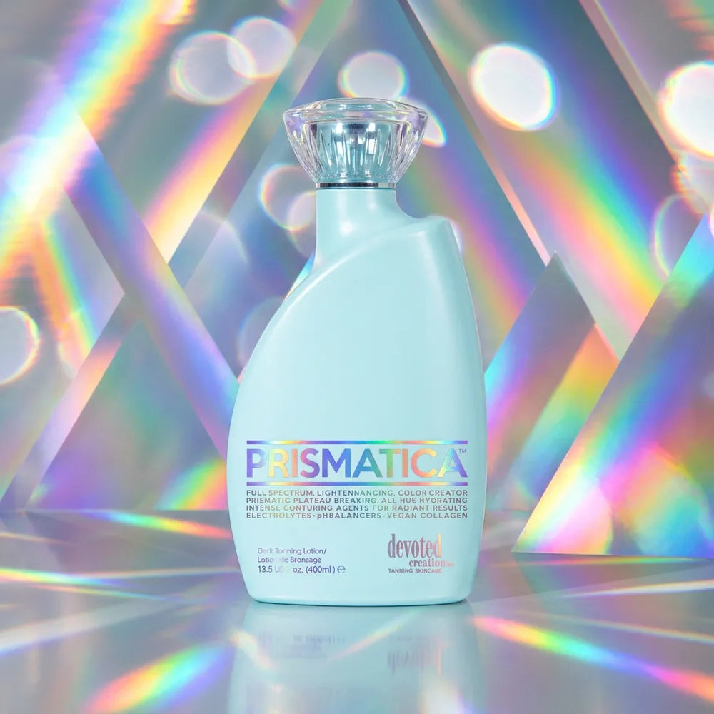 Devoted Creations Prismatica bronzer — light iridescent bottle in a clean, airy scene.